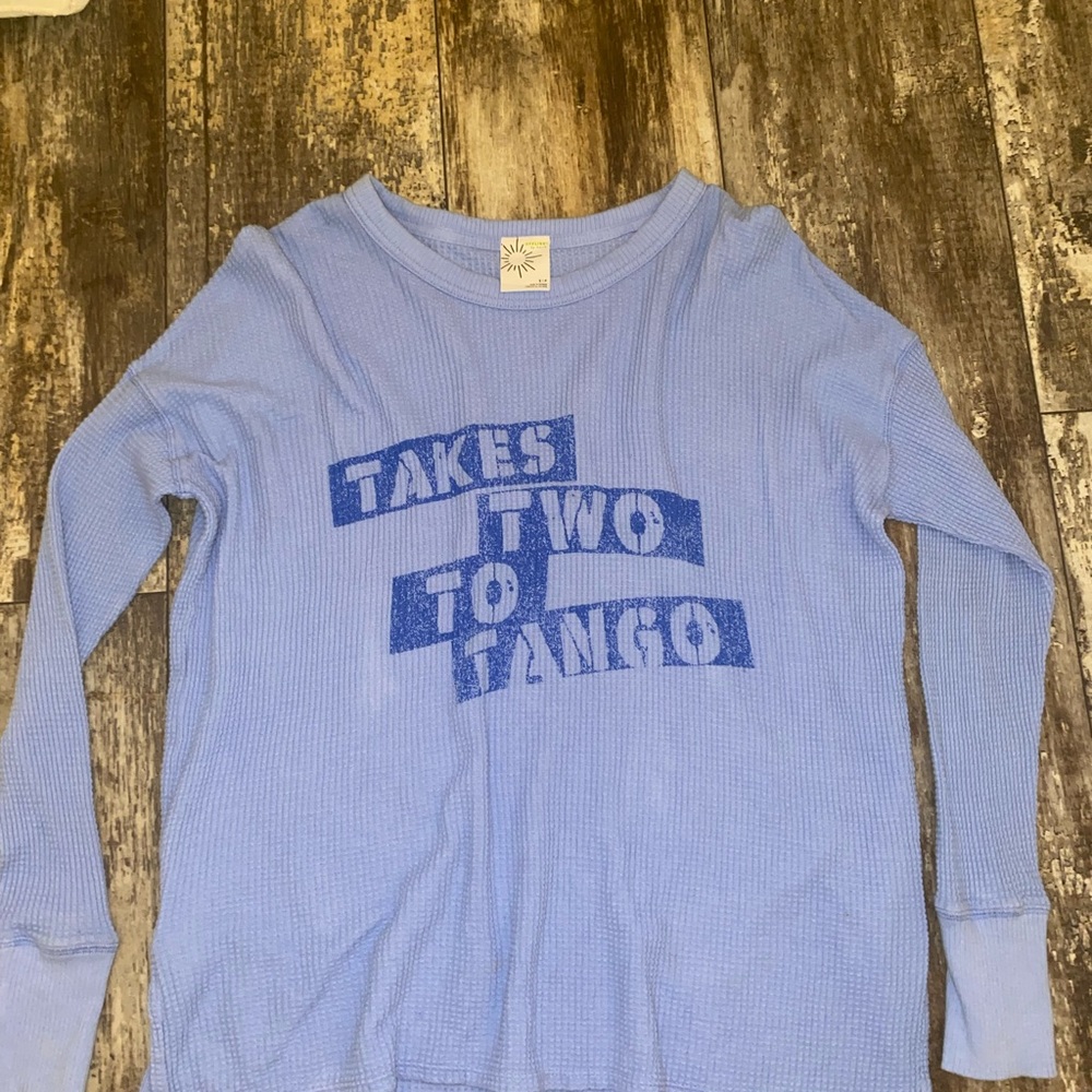 Size small long sleeve shirt! only worn once, smoke free home.